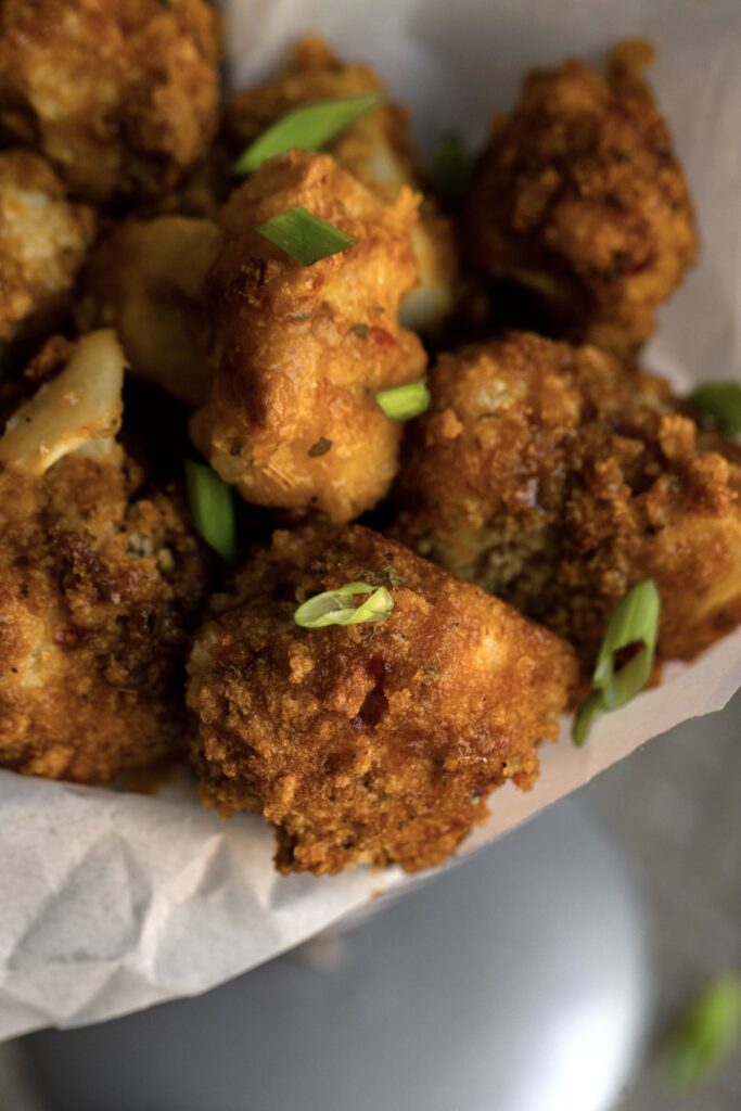 It's truly impossible to have just one of these sweet and spicy cauliflower bites!