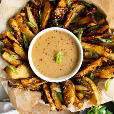 Sweet potatoes have never tasted so good! These white sweet potatoes are roasted in miso paste and served with an irresistible miso-tahini sauce. This recipe is the perfect side dish, appetizer, or healthy snack!