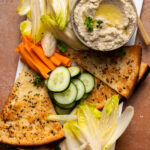 Serve this dip alongside crispy pita, veggies, and endive leaves for the perfect mezze platter.