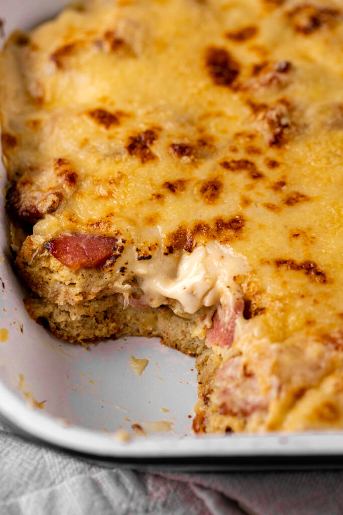 A close up look at the details of this monsieur bake showing detail in the cheese and ham.